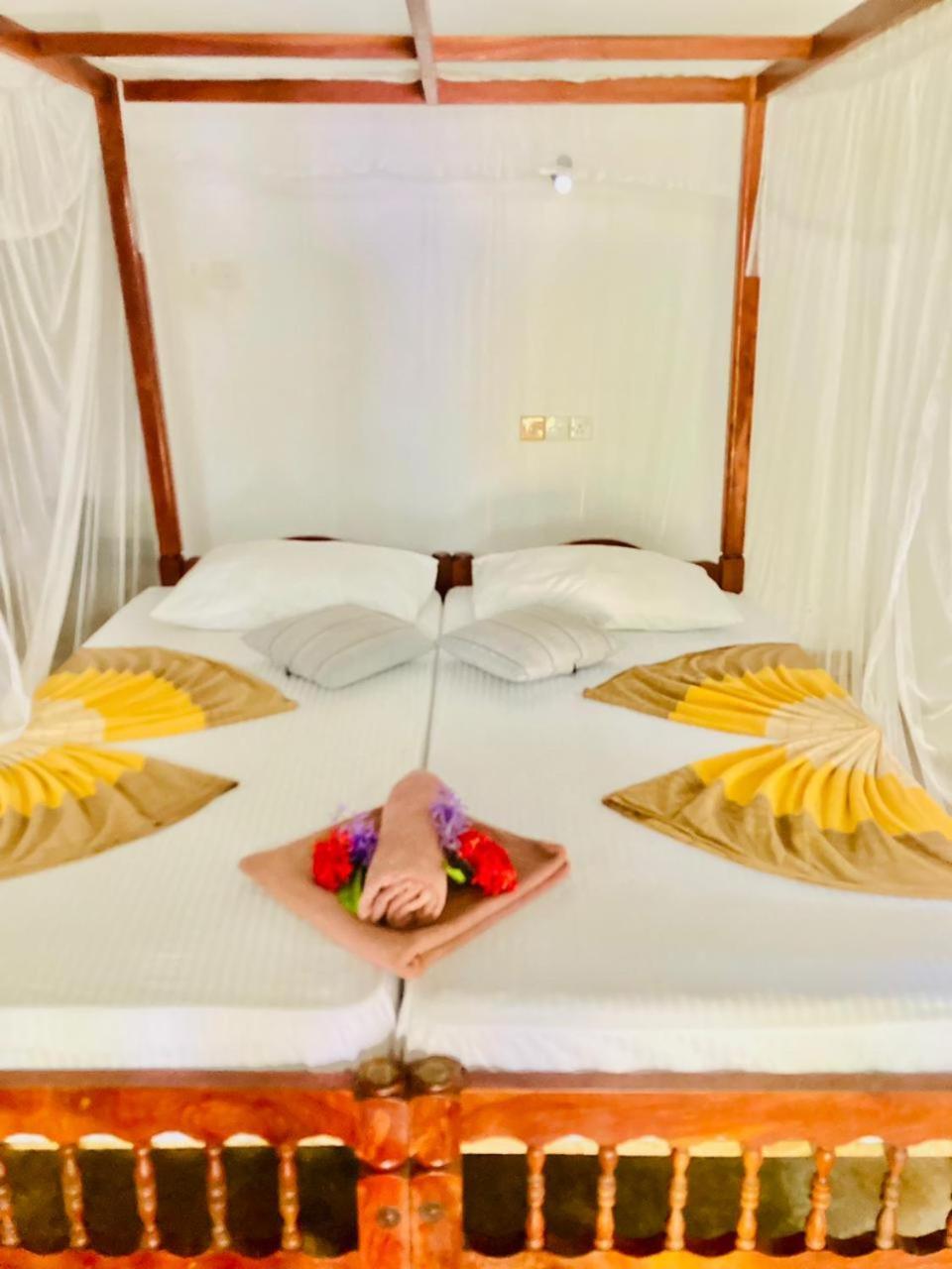 Dilena Beach Inn Тангале Стая снимка