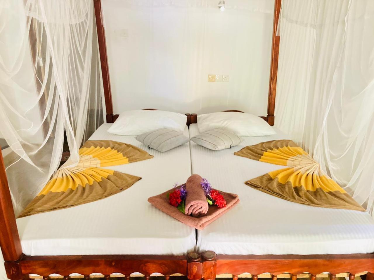 Dilena Beach Inn Тангале Стая снимка