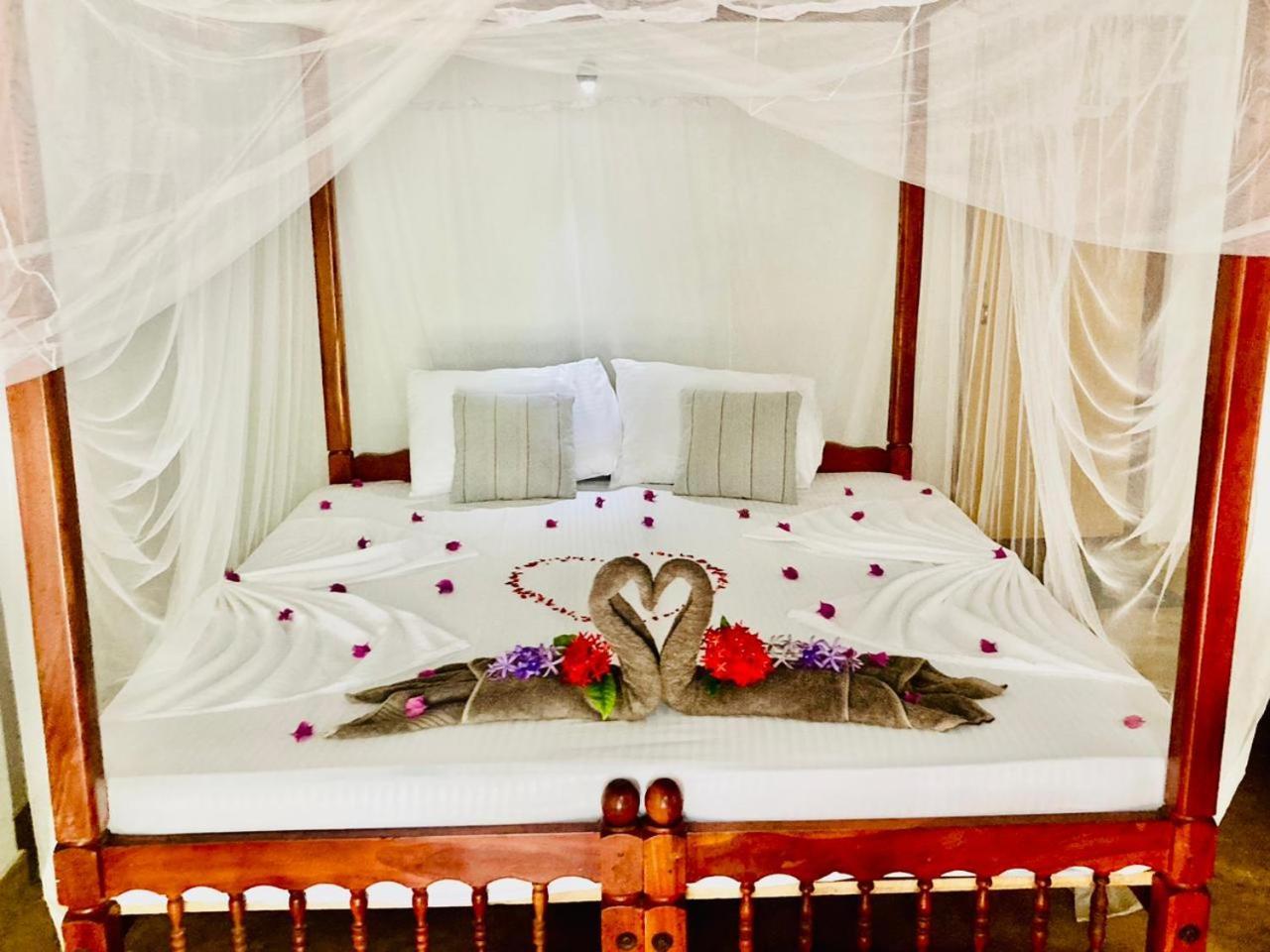 Dilena Beach Inn Тангале Стая снимка