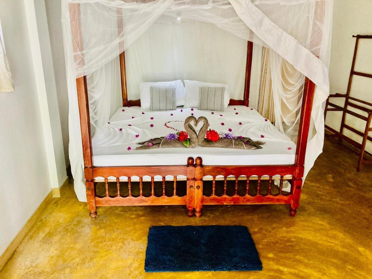 Dilena Beach Inn Тангале Стая снимка